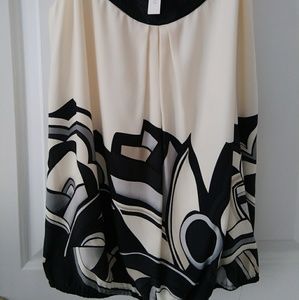 Cream top with gray and black design